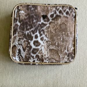 Leopard pattern large travel makeup and skin care case. 4 compartments. NEW!